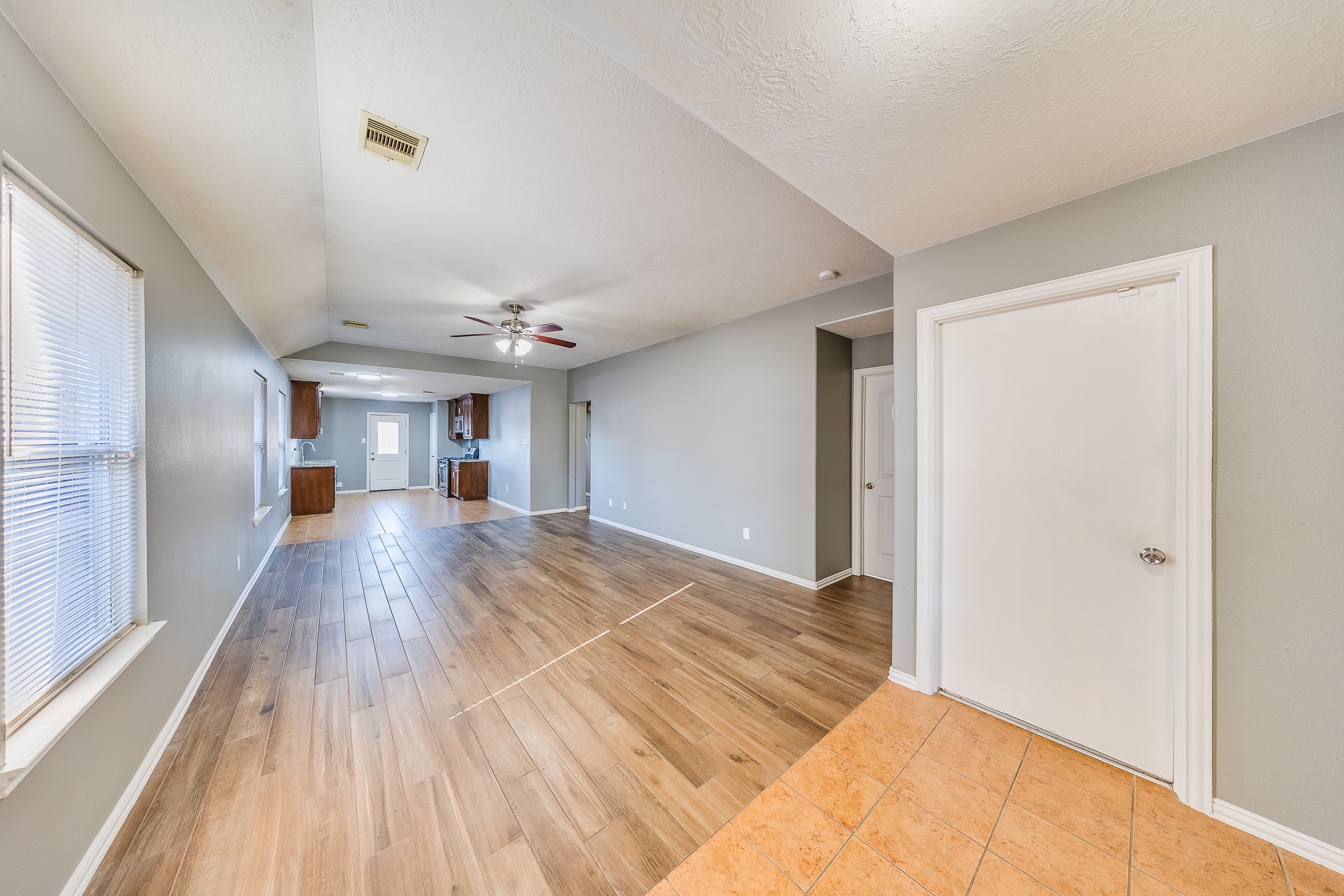 21927 Octavia Way Houston, TX 77073 - Photo 9 of 28 Bright living room filled with natural light, open feel, and welcoming atmosphere, perfect for everyday living and entertaining.
