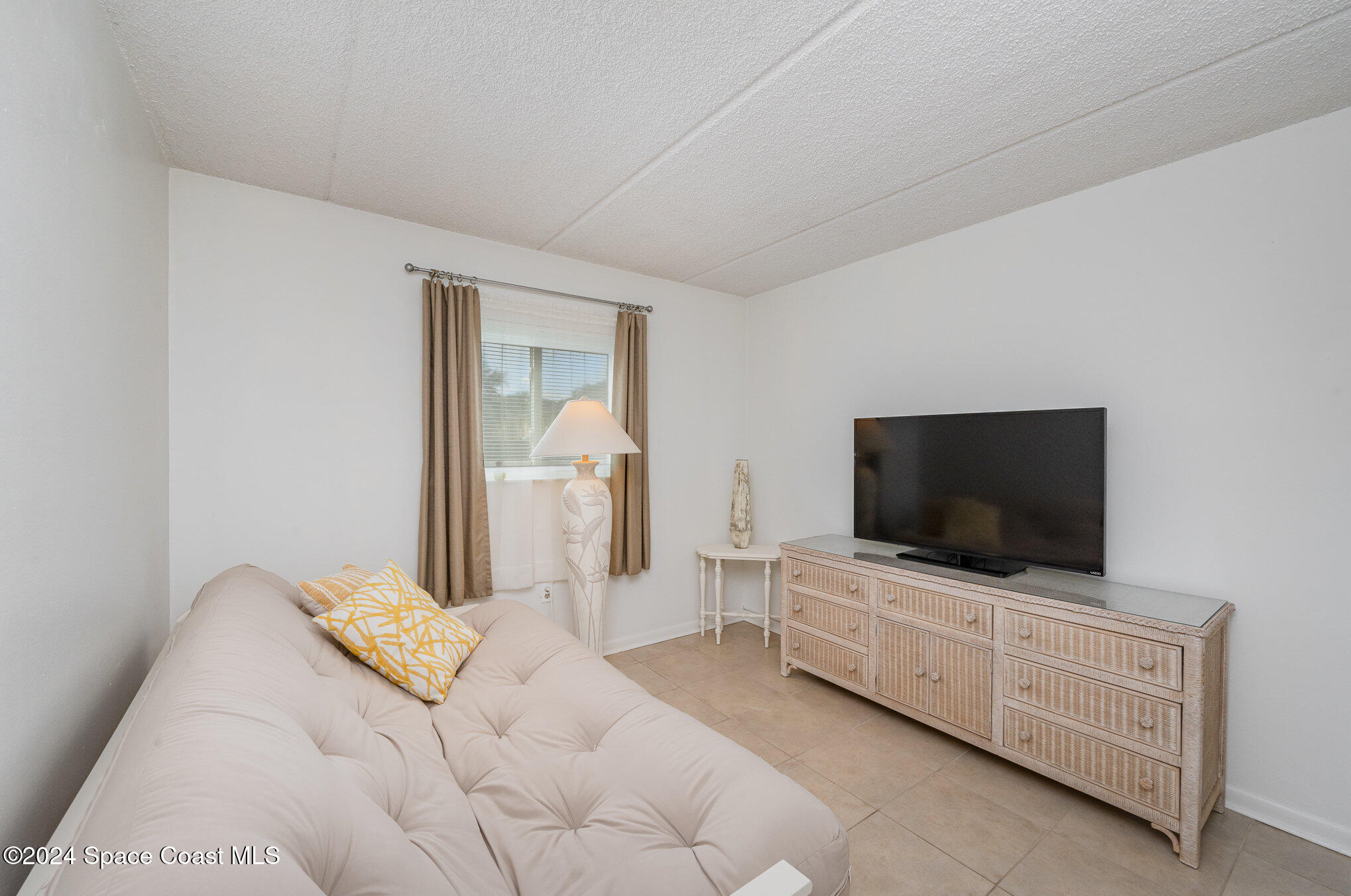 641 Ridge Club Drive, Unit 21 Melbourne, FL 32934 - Photo 14 of 23 Living Space 2