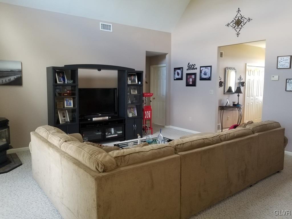 1032 Bushkill Center Road Wind Gap, PA 18091 - Photo 15 of 47 a living room with furniture and a flat screen tv