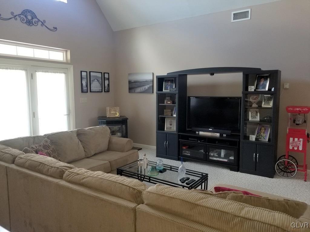 1032 Bushkill Center Road Wind Gap, PA 18091 - Photo 17 of 47 a living room with furniture and a flat screen tv