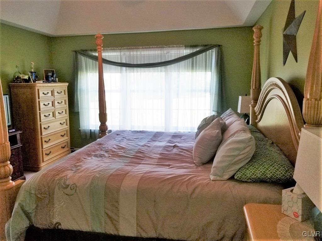 1032 Bushkill Center Road Wind Gap, PA 18091 - Photo 25 of 47 a bedroom with a bed and a dresser