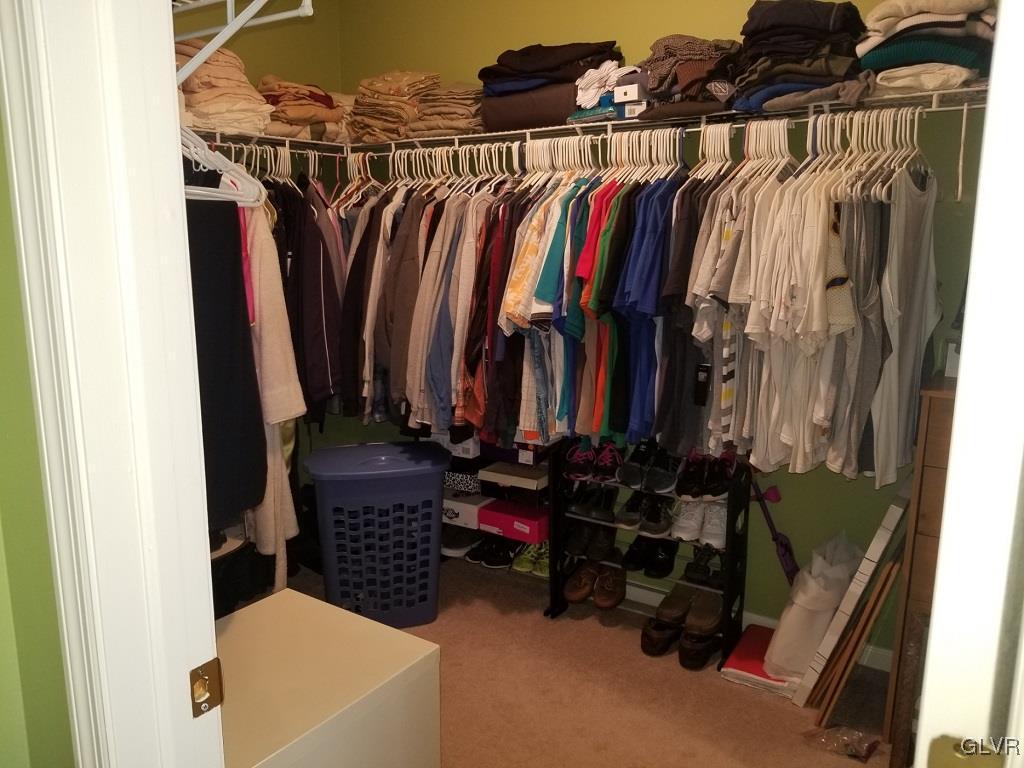 1032 Bushkill Center Road Wind Gap, PA 18091 - Photo 29 of 47 a view of walk in closet with clothes and shoes