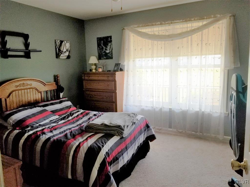 1032 Bushkill Center Road Wind Gap, PA 18091 - Photo 30 of 47 a bedroom with a bed and a window