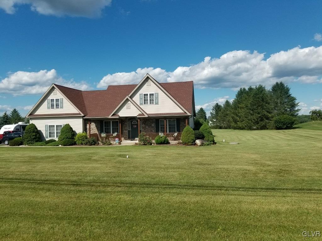 1032 Bushkill Center Road Wind Gap, PA 18091 - Photo 3 of 47 a front view of a house with a garden