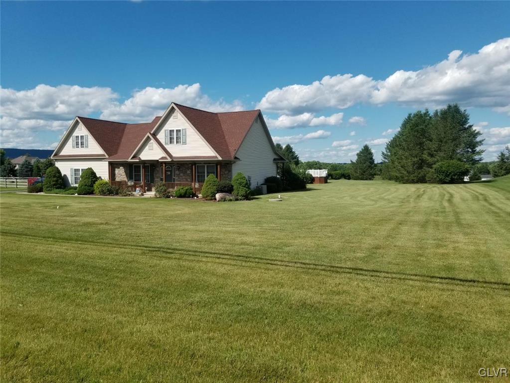 1032 Bushkill Center Road Wind Gap, PA 18091 - Photo 4 of 47 a view of an house with backyard space and balcony