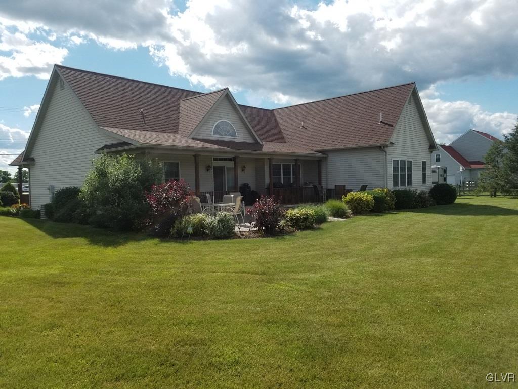 1032 Bushkill Center Road Wind Gap, PA 18091 - Photo 5 of 47 a front view of house with yard and green space