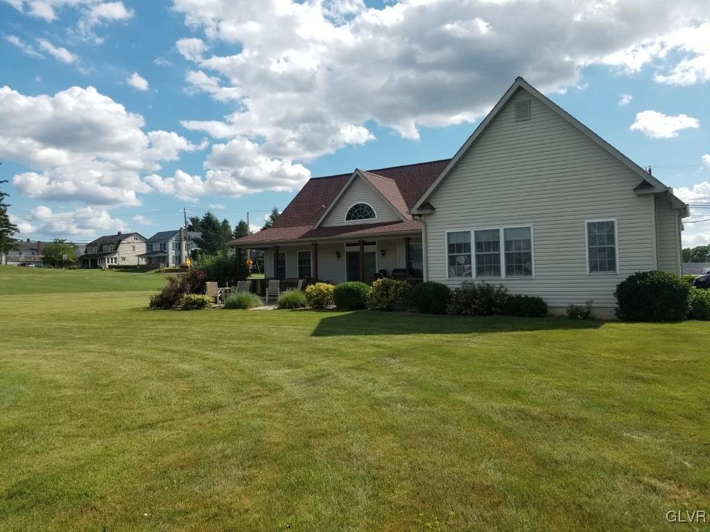 1032 Bushkill Center Road Wind Gap, PA 18091 - Photo 6 of 47 a front view of a house with garden