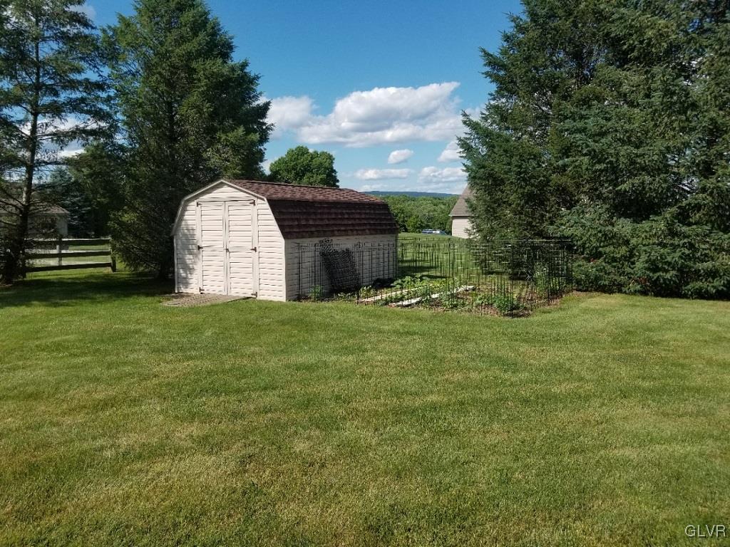 1032 Bushkill Center Road Wind Gap, PA 18091 - Photo 9 of 47 a view of a house with a yard