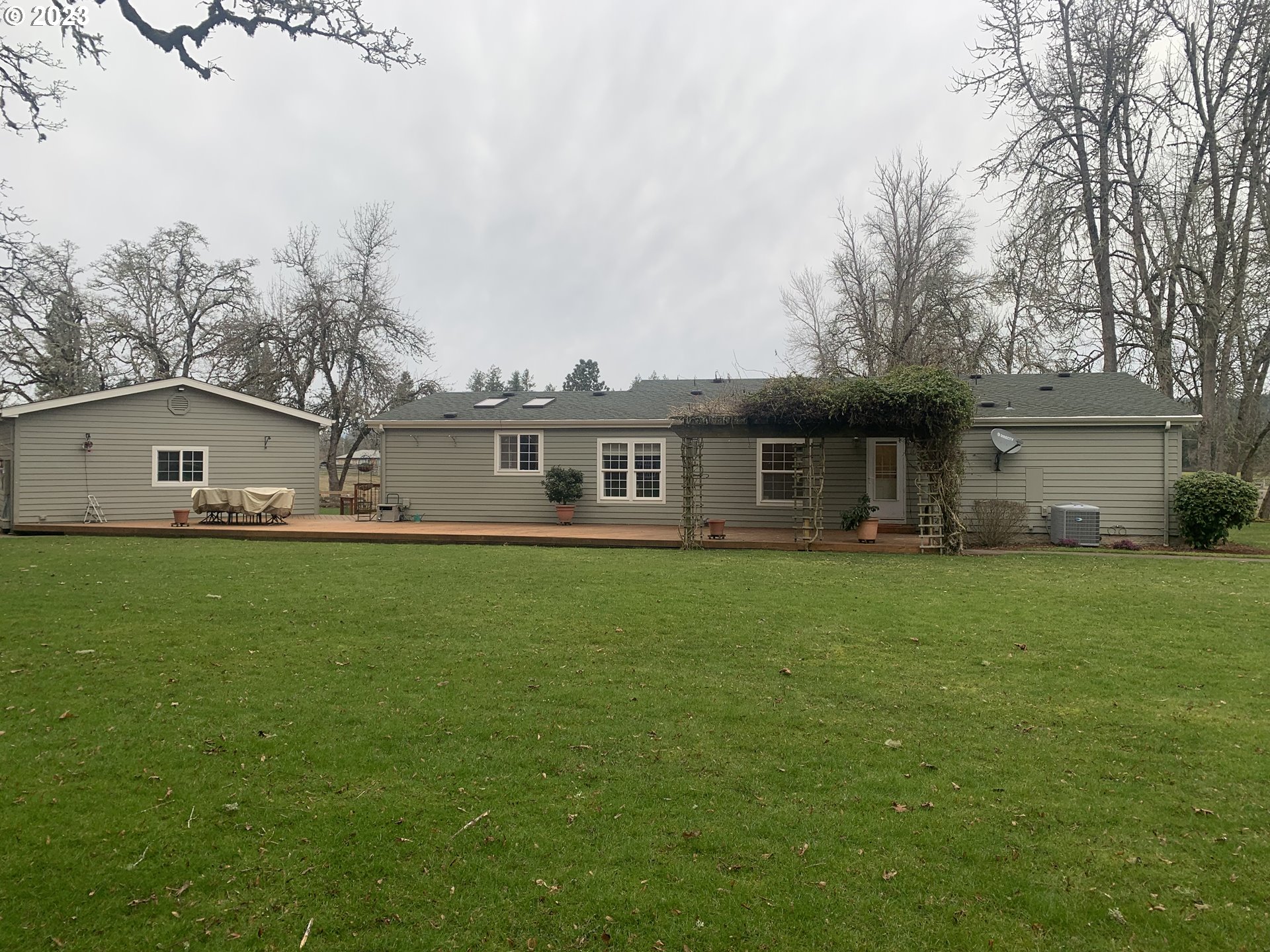 36934 Wheeler Road Pleasant Hill, OR 97455 - Photo 23 of 31 a front view of house with yard and trees