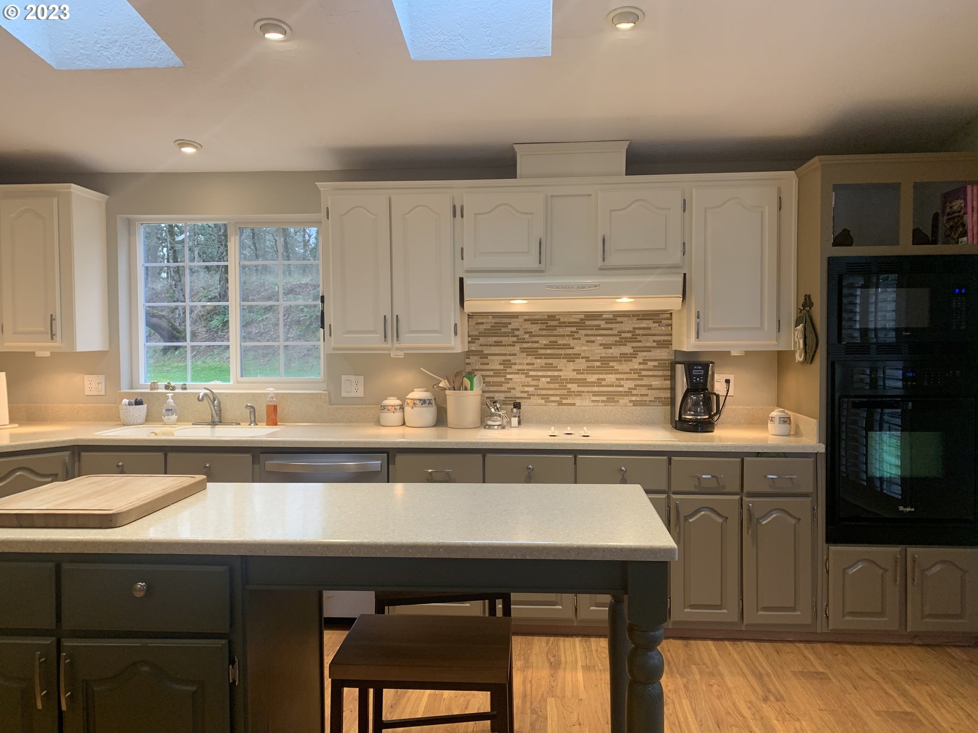 36934 Wheeler Road Pleasant Hill, OR 97455 - Photo 6 of 31 a kitchen with a sink cabinets and window