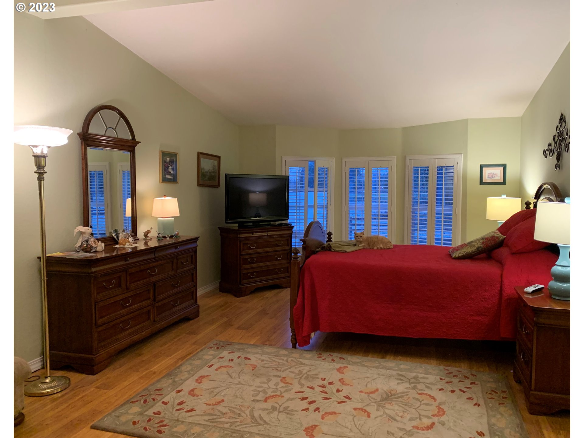 36934 Wheeler Road Pleasant Hill, OR 97455 - Photo 9 of 31 a bed room with a bed and a television