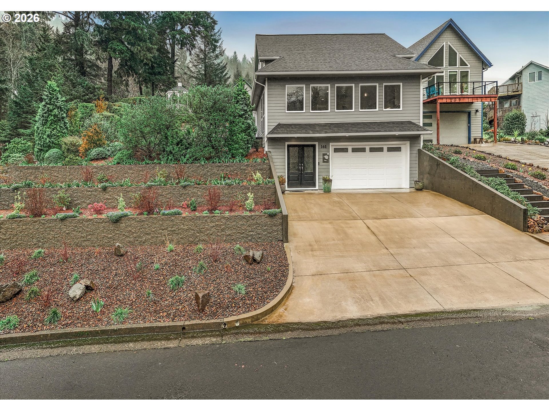 161 Combs Circle Yachats, OR 97498 - Photo 11 of 48 a view of a house with a yard