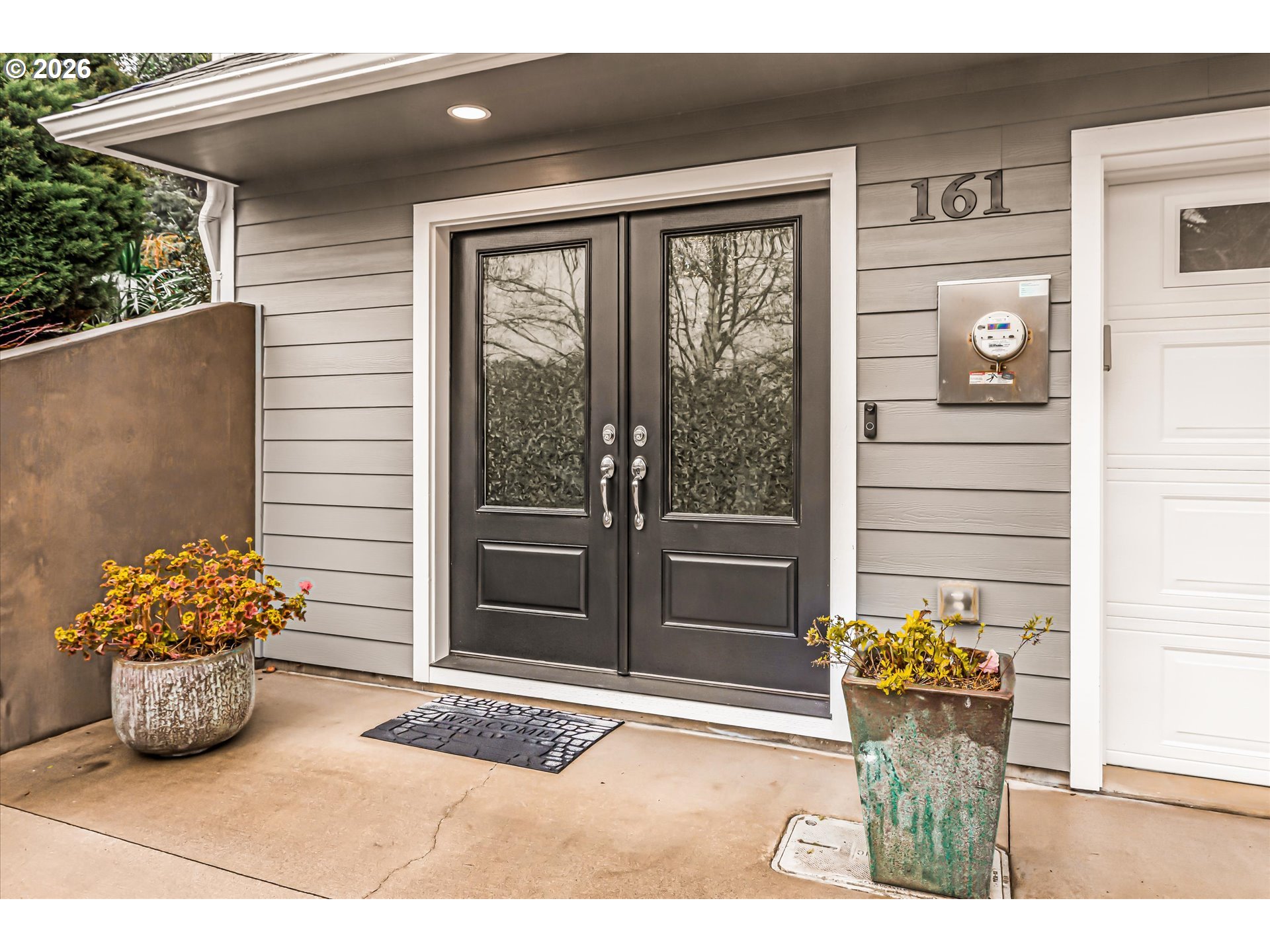 161 Combs Circle Yachats, OR 97498 - Photo 13 of 48 a view of a entryway door front of house