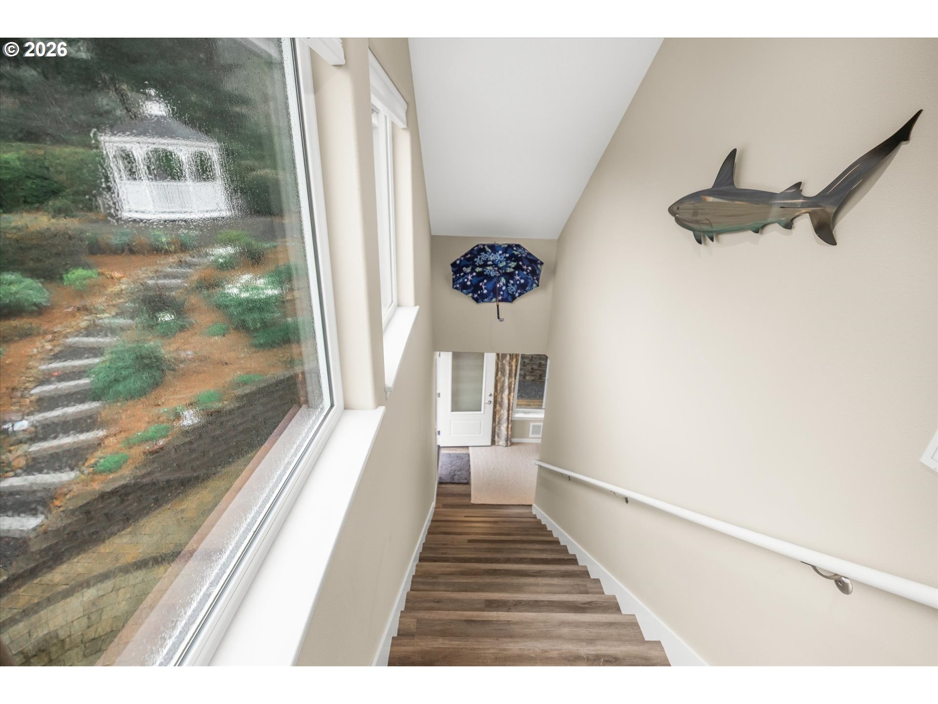 161 Combs Circle Yachats, OR 97498 - Photo 39 of 48 a view of a hallway with a large window