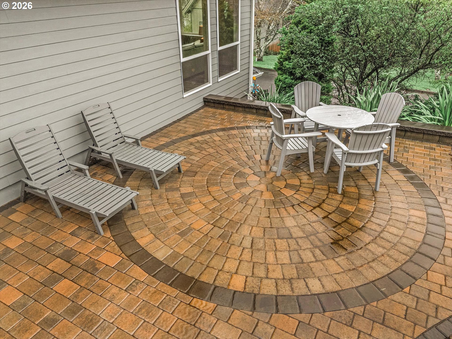 161 Combs Circle Yachats, OR 97498 - Photo 6 of 48 a view of a patio with a table and chairs