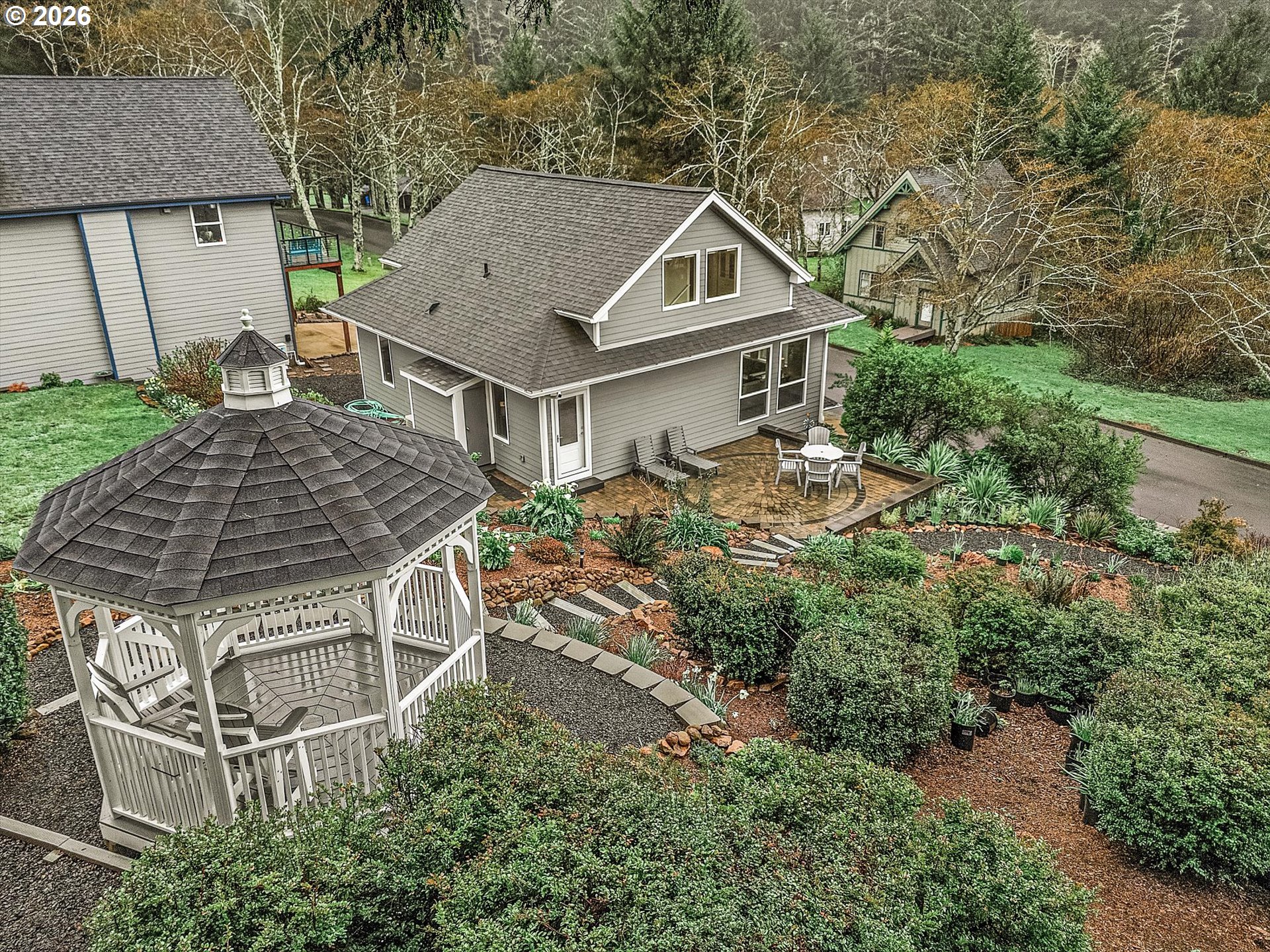 161 Combs Circle Yachats, OR 97498 - Photo 7 of 48 an aerial view of a house with a yard
