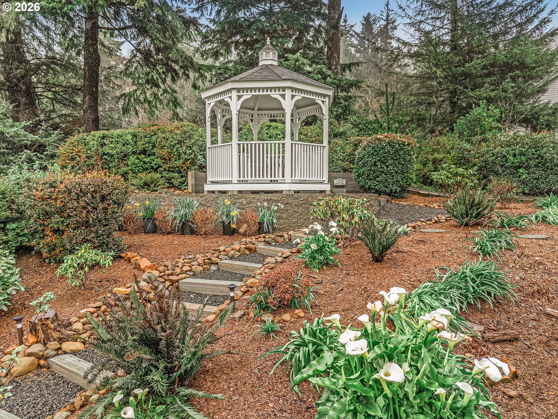 161 Combs Circle Yachats, OR 97498 - Photo 8 of 48 a front view of a house with a yard