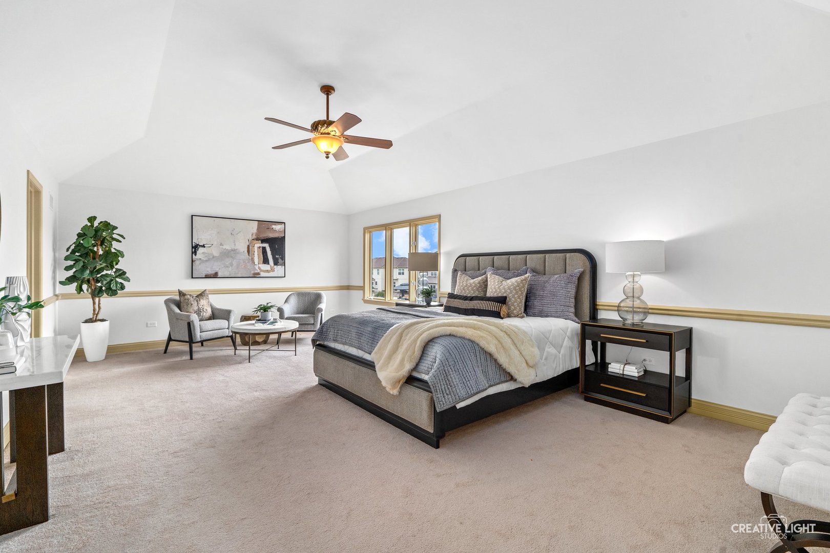 1887 Snead Street Bolingbrook, IL 60490 - Photo 20 of 49 a bedroom with furniture and a chandelier
