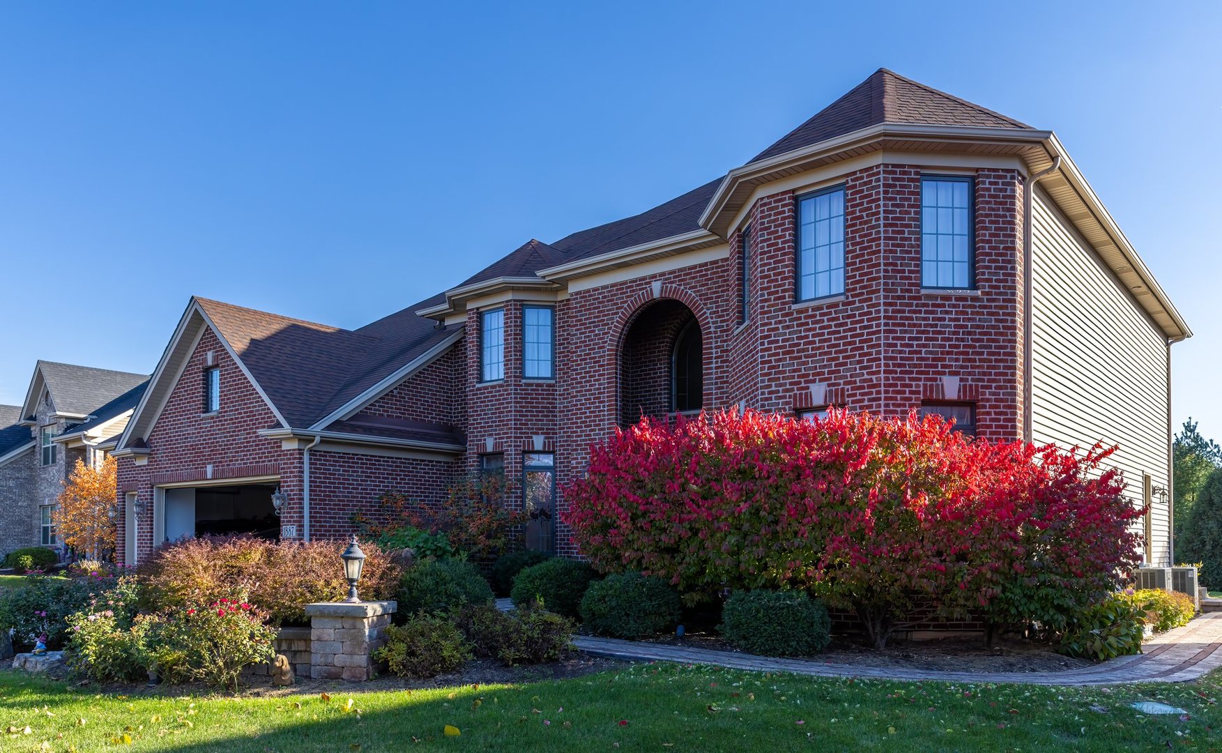 1887 Snead Street Bolingbrook, IL 60490 - Photo 2 of 49 a front view of a house with garden