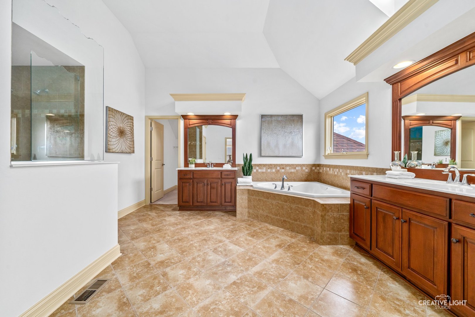 1887 Snead Street Bolingbrook, IL 60490 - Photo 21 of 49 a large white tub sitting in a room next to a large window