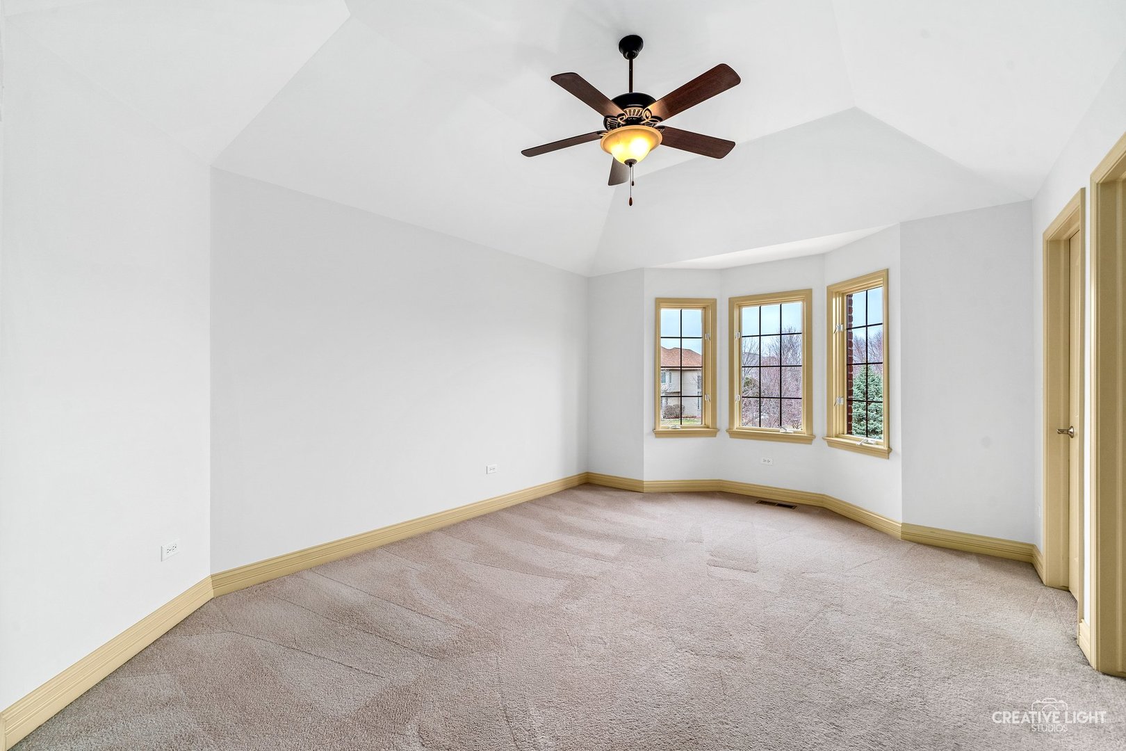 1887 Snead Street Bolingbrook, IL 60490 - Photo 23 of 49 an empty room with a window and a ceiling fan