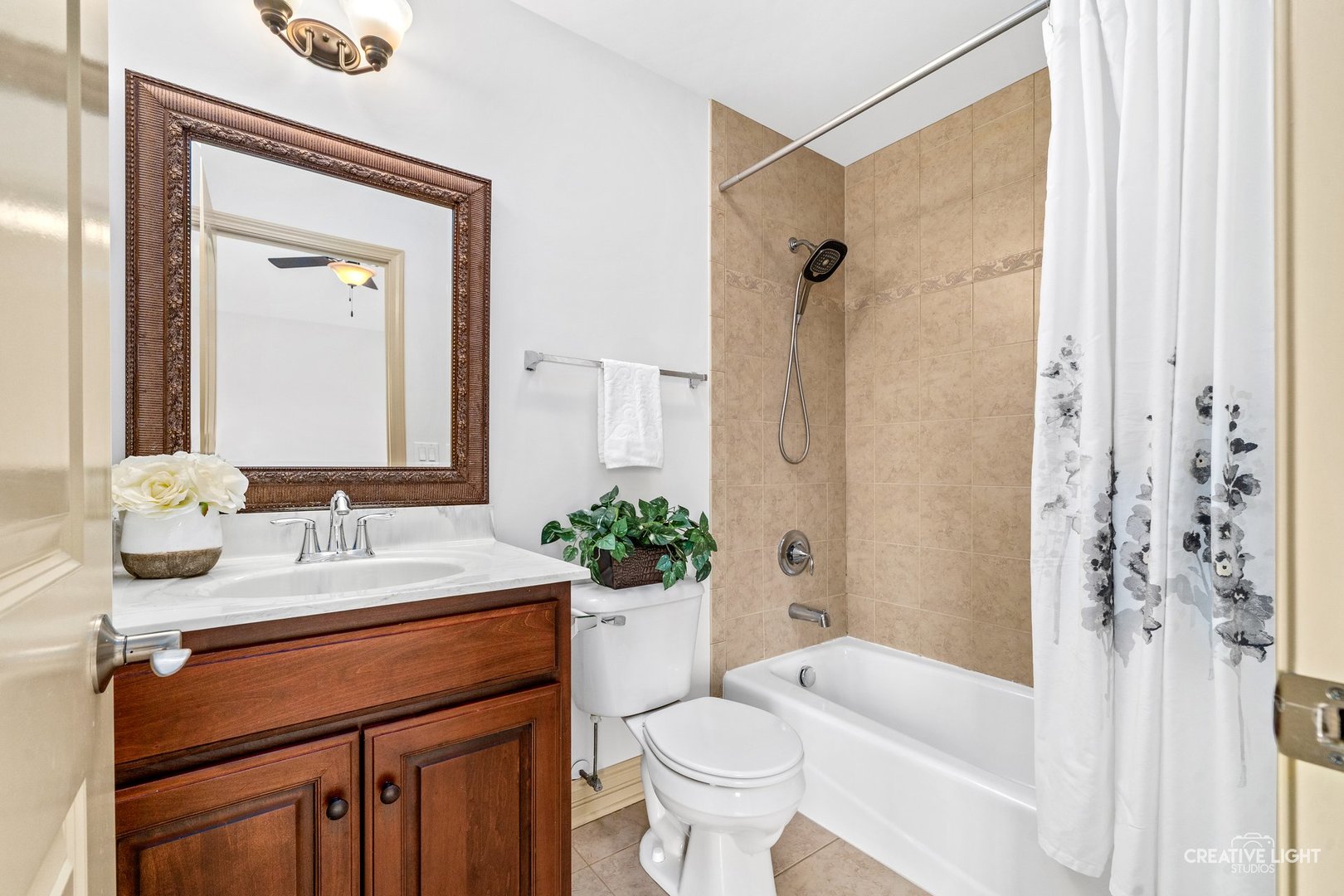 1887 Snead Street Bolingbrook, IL 60490 - Photo 24 of 49 a bathroom with a sink toilet and shower