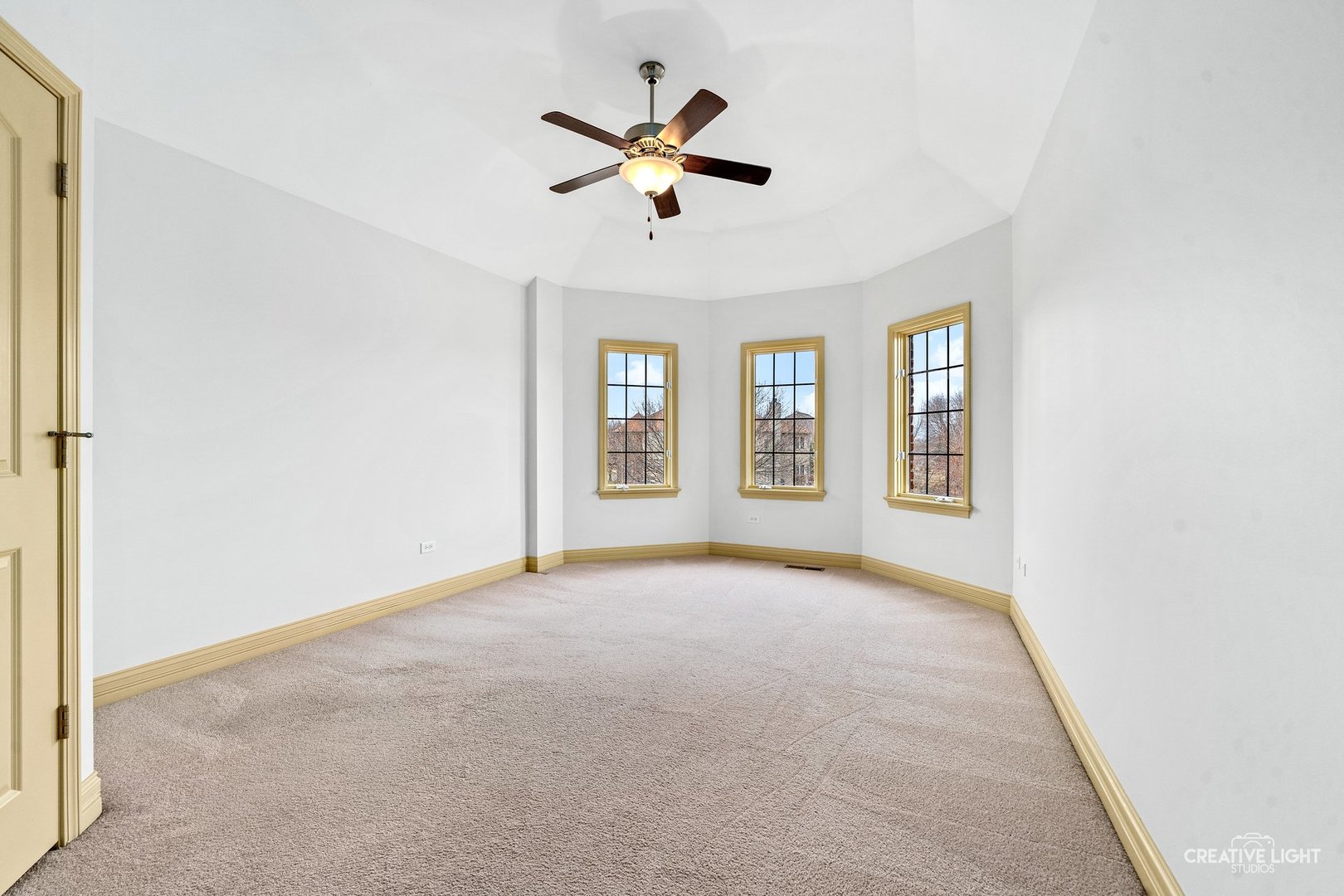1887 Snead Street Bolingbrook, IL 60490 - Photo 25 of 49 an empty room with windows and ceiling fan