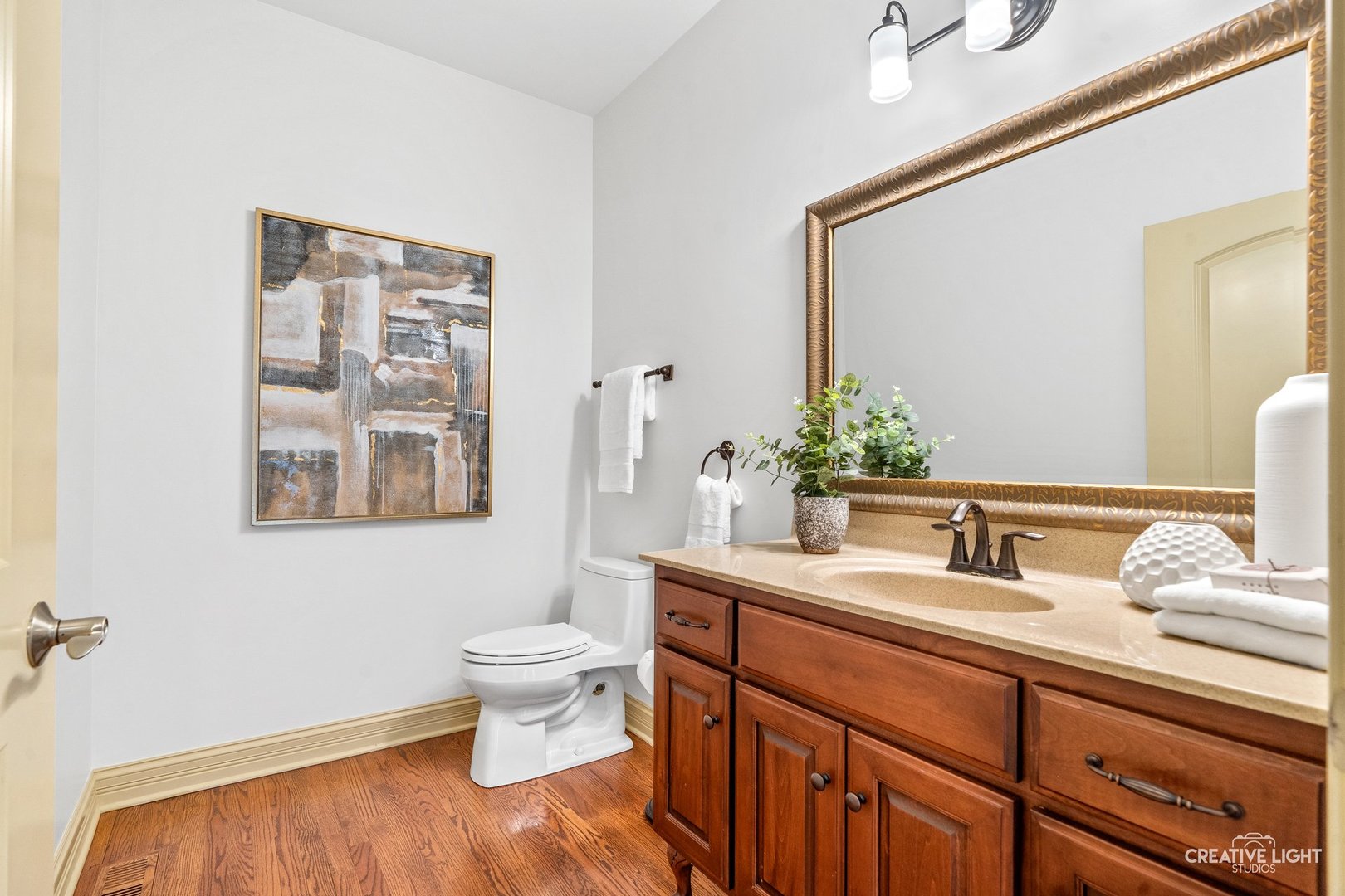 1887 Snead Street Bolingbrook, IL 60490 - Photo 29 of 49 a bathroom with a toilet sink and mirror