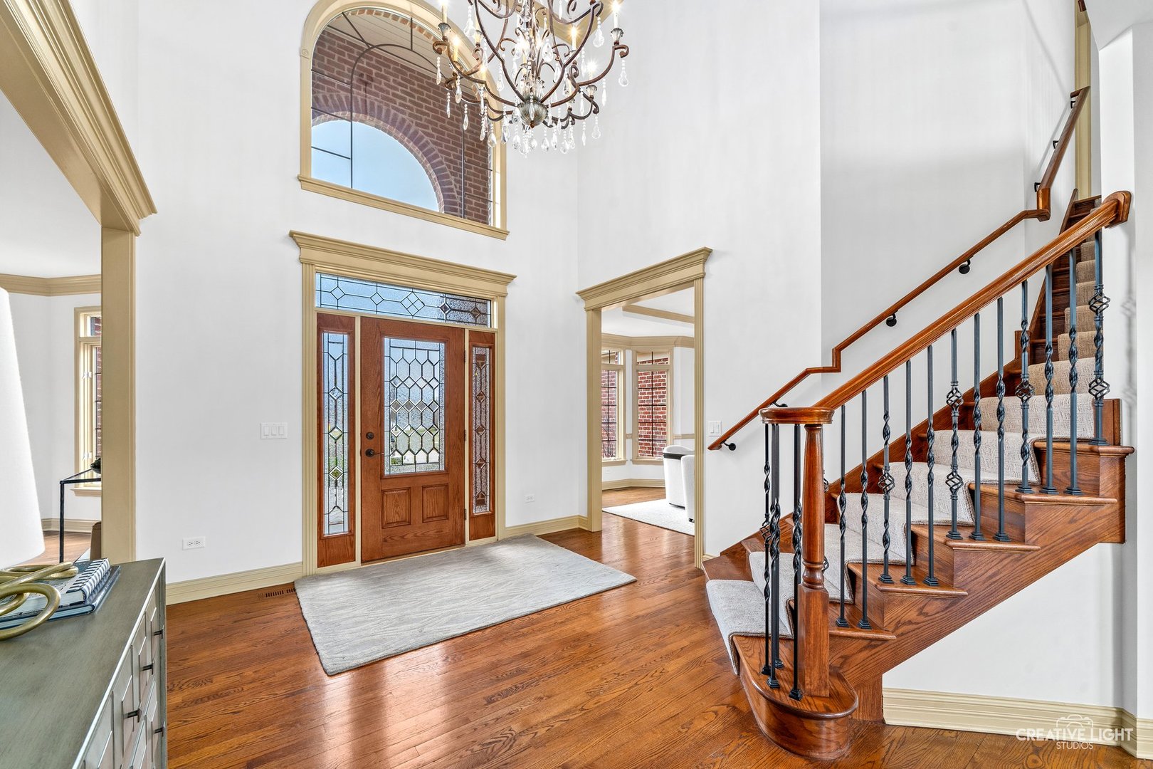 1887 Snead Street Bolingbrook, IL 60490 - Photo 4 of 49 a view of an entryway with wooden floor and stairs