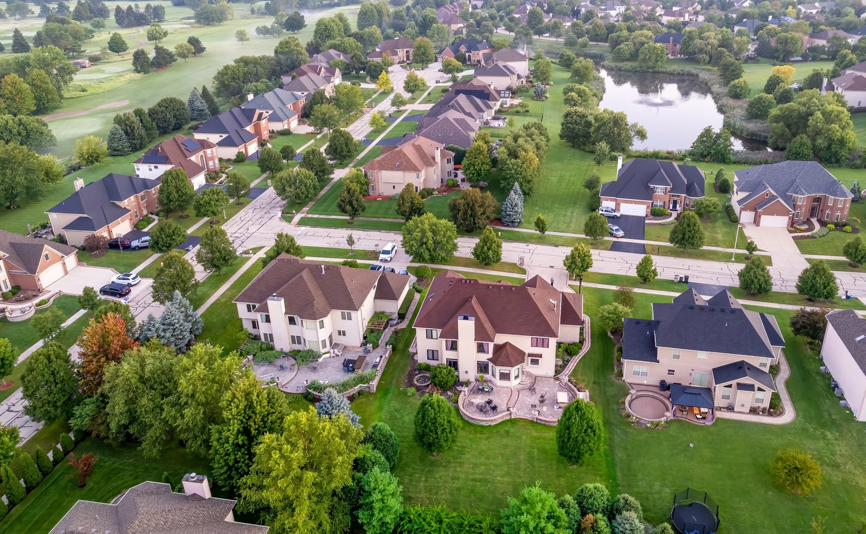 1887 Snead Street Bolingbrook, IL 60490 - Photo 46 of 49 an aerial view of a house with a garden and swimming pool