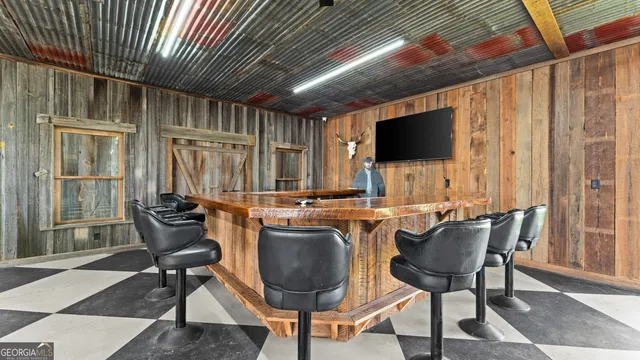 a view of a golf course with an outdoor space