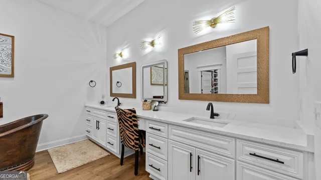 a view of a horse with a colt and a yard in back