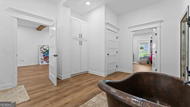 a view of a balcony with chair and window