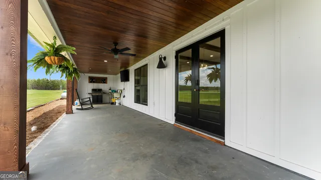 a view of a golf course with a lake view