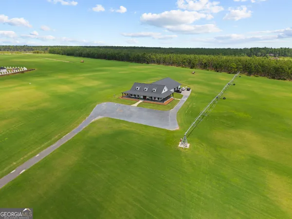 a view of a golf course with a yard
