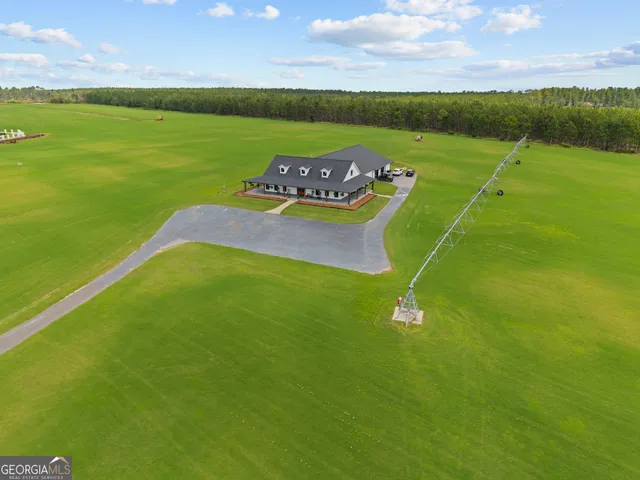 a view of a golf course with a lake