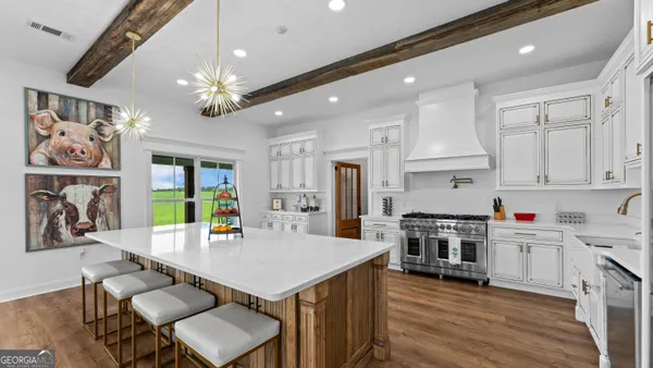 a living room with furniture window and a flat screen tv