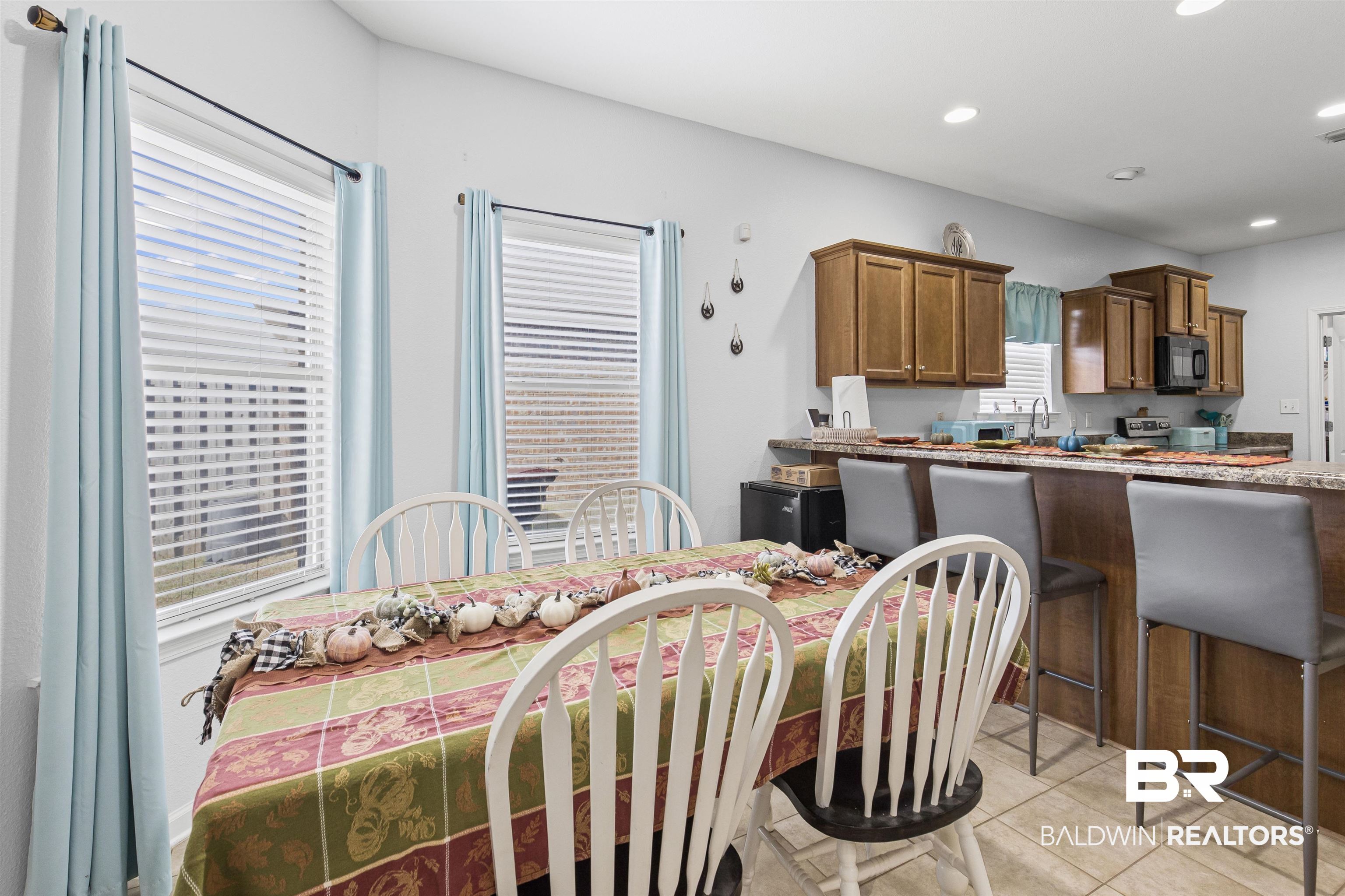 4107 Nottingham Drive Semmes, AL 36575 - Photo 5 of 23 Dining space with recessed lighting and light tile patterned floors