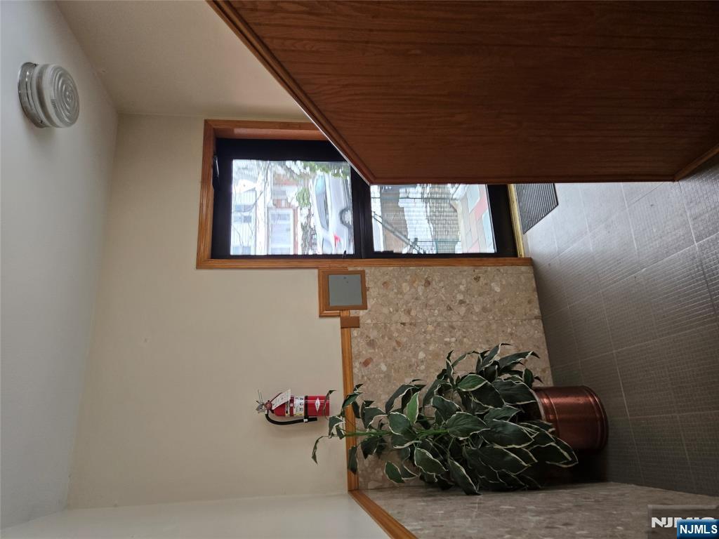 382 Lakeview Avenue, Unit 1 Clifton, NJ 07011 - Photo 2 of 13 a view of a livingroom with closet