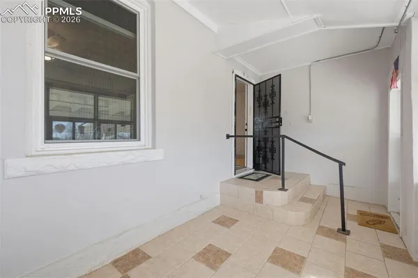 a view of a hallway with closet