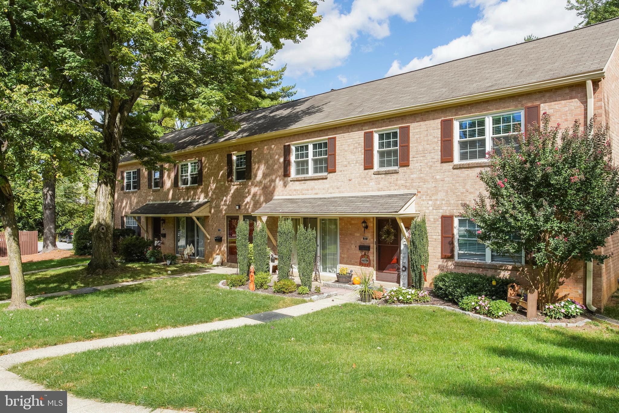 58 Old Forge Crossing Devon, PA 19333 - Photo 20 of 23 a front view of a house with a yard