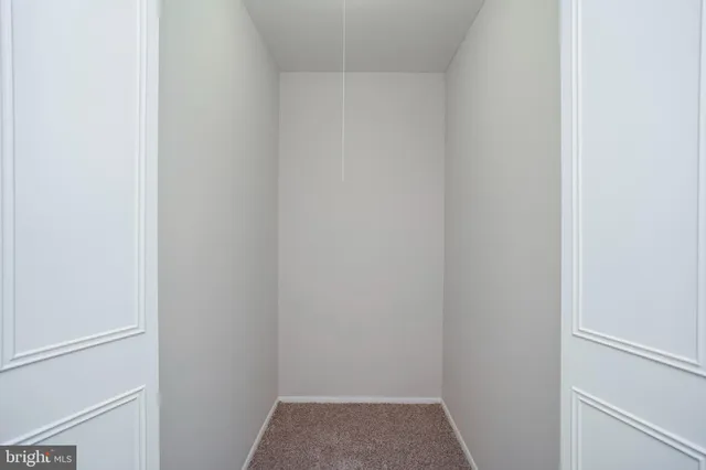 a view of small space with racks on the wall