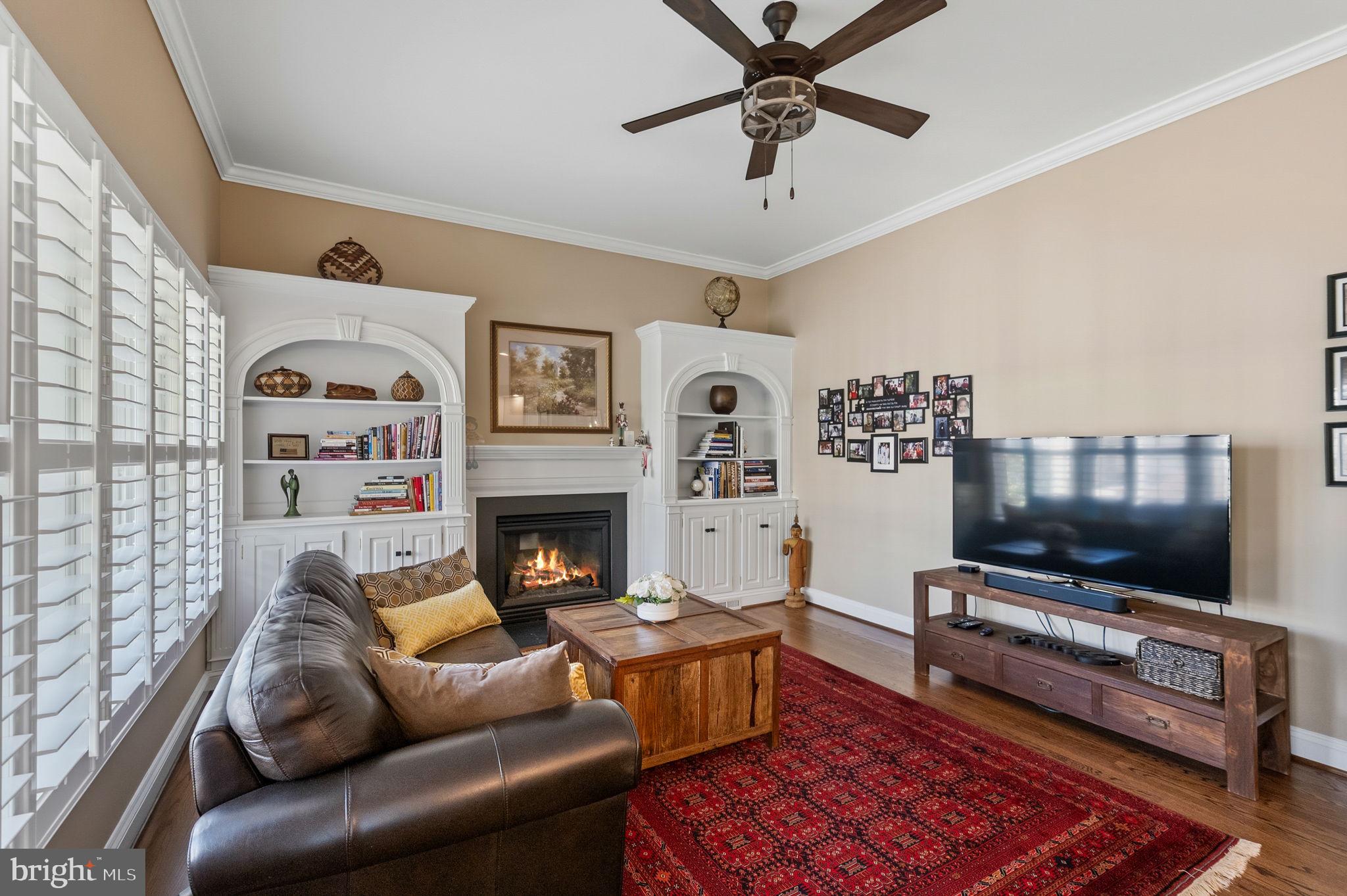 2656 Brook Valley Road Frederick, MD 21701 - Photo 35 of 89 a living room with furniture and a flat screen tv