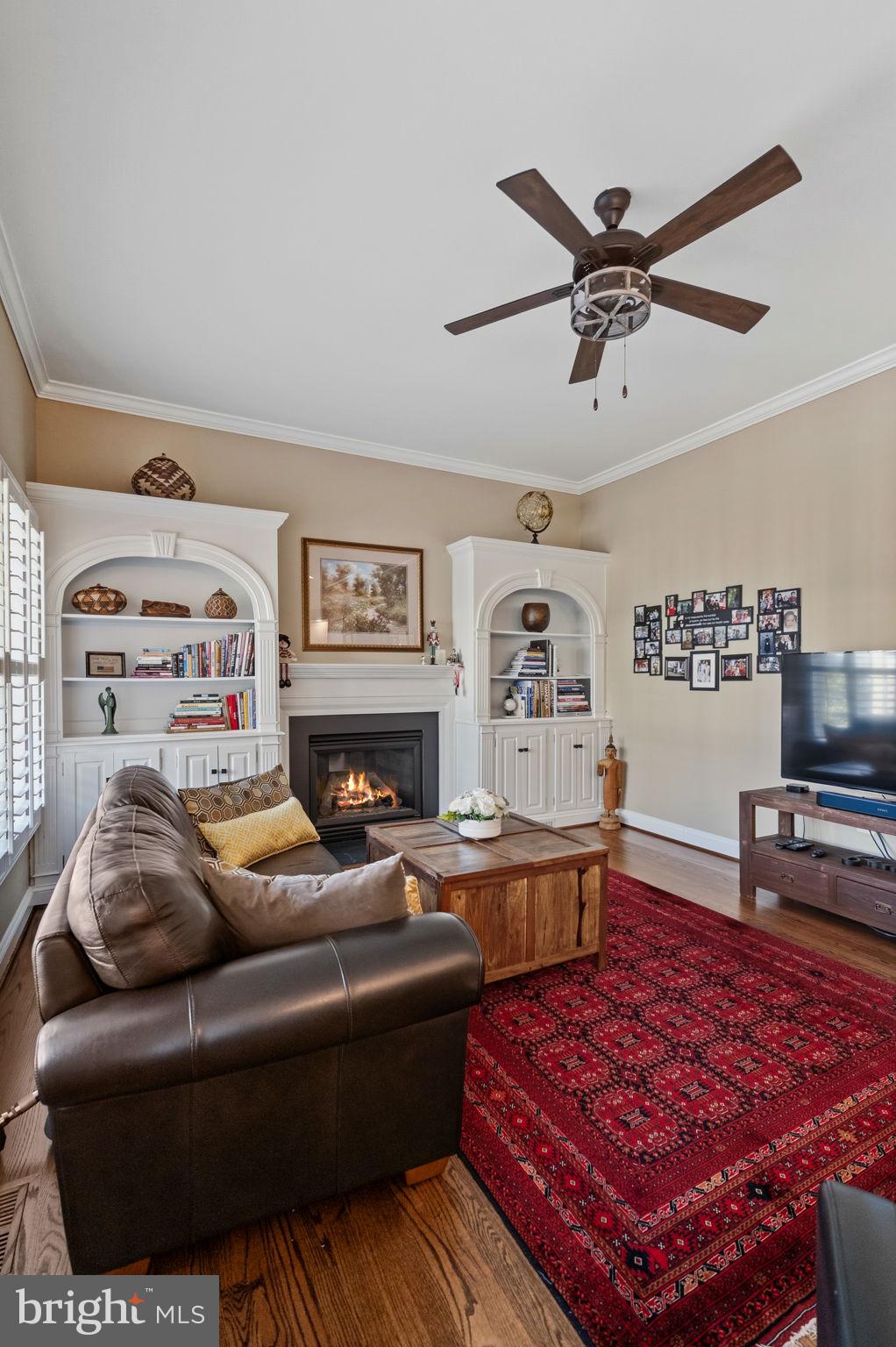 2656 Brook Valley Road Frederick, MD 21701 - Photo 36 of 89 a living room with furniture and a flat screen tv