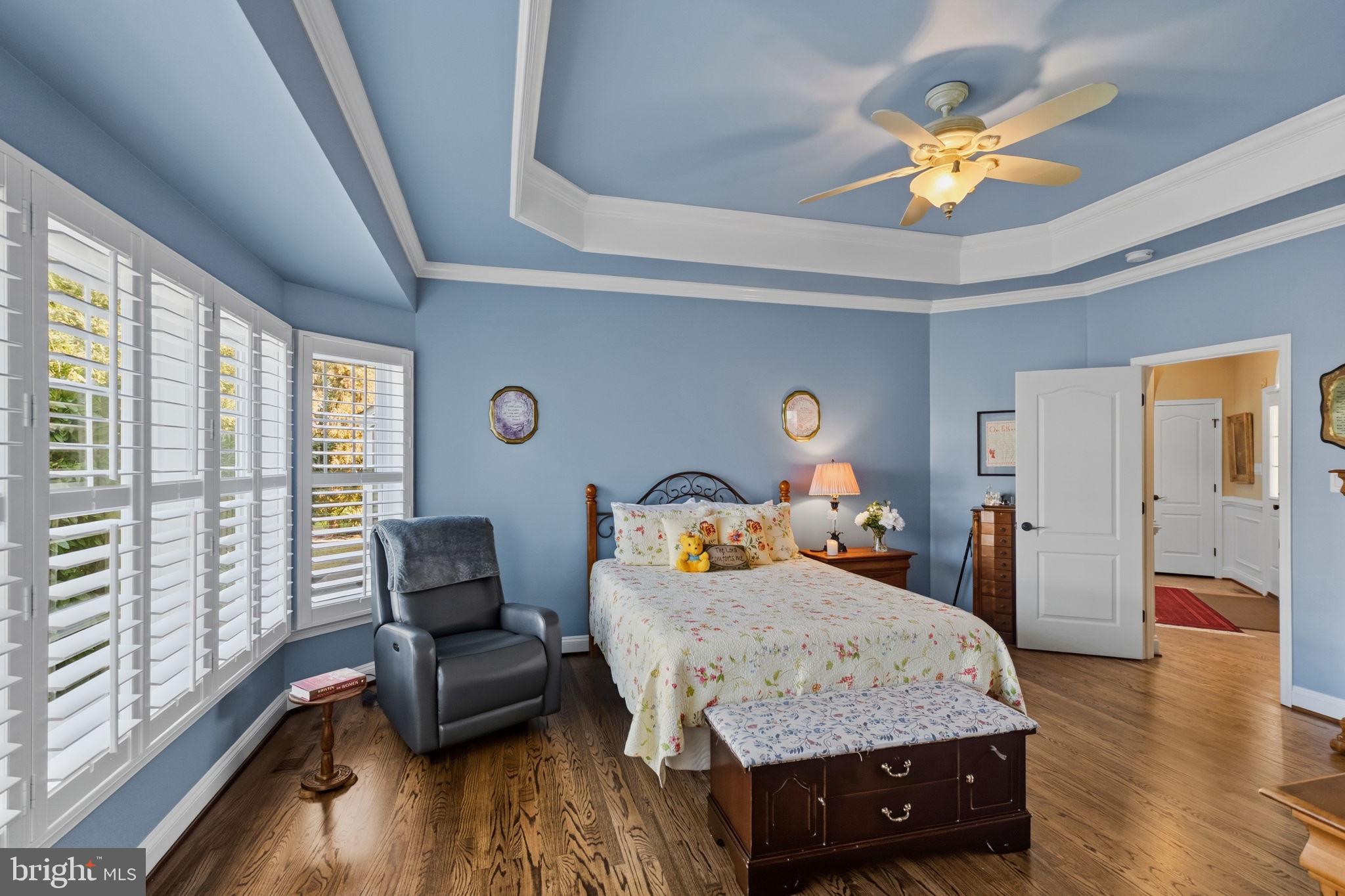 2656 Brook Valley Road Frederick, MD 21701 - Photo 47 of 89 a bedroom with a bed and wooden floor