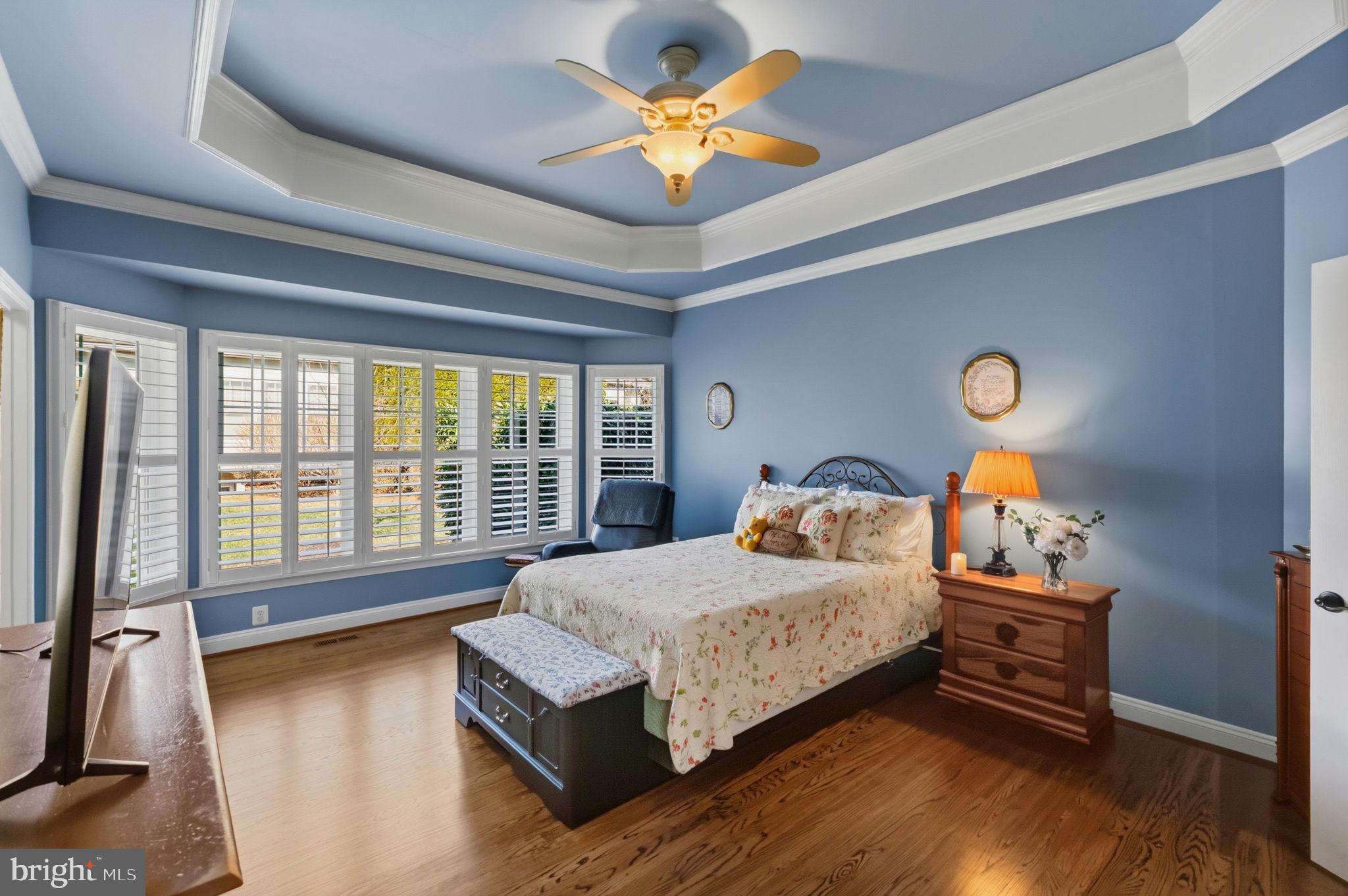 2656 Brook Valley Road Frederick, MD 21701 - Photo 48 of 89 a bedroom with a bed and a chandelier