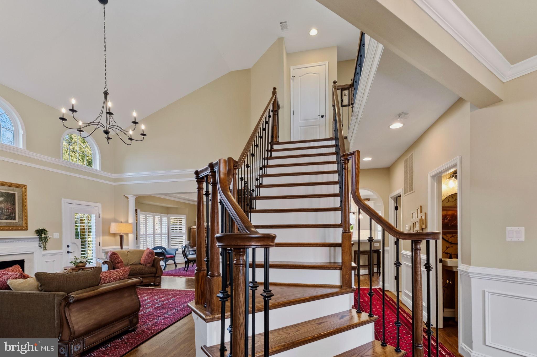 2656 Brook Valley Road Frederick, MD 21701 - Photo 55 of 89 a living room with wooden floor and stairs