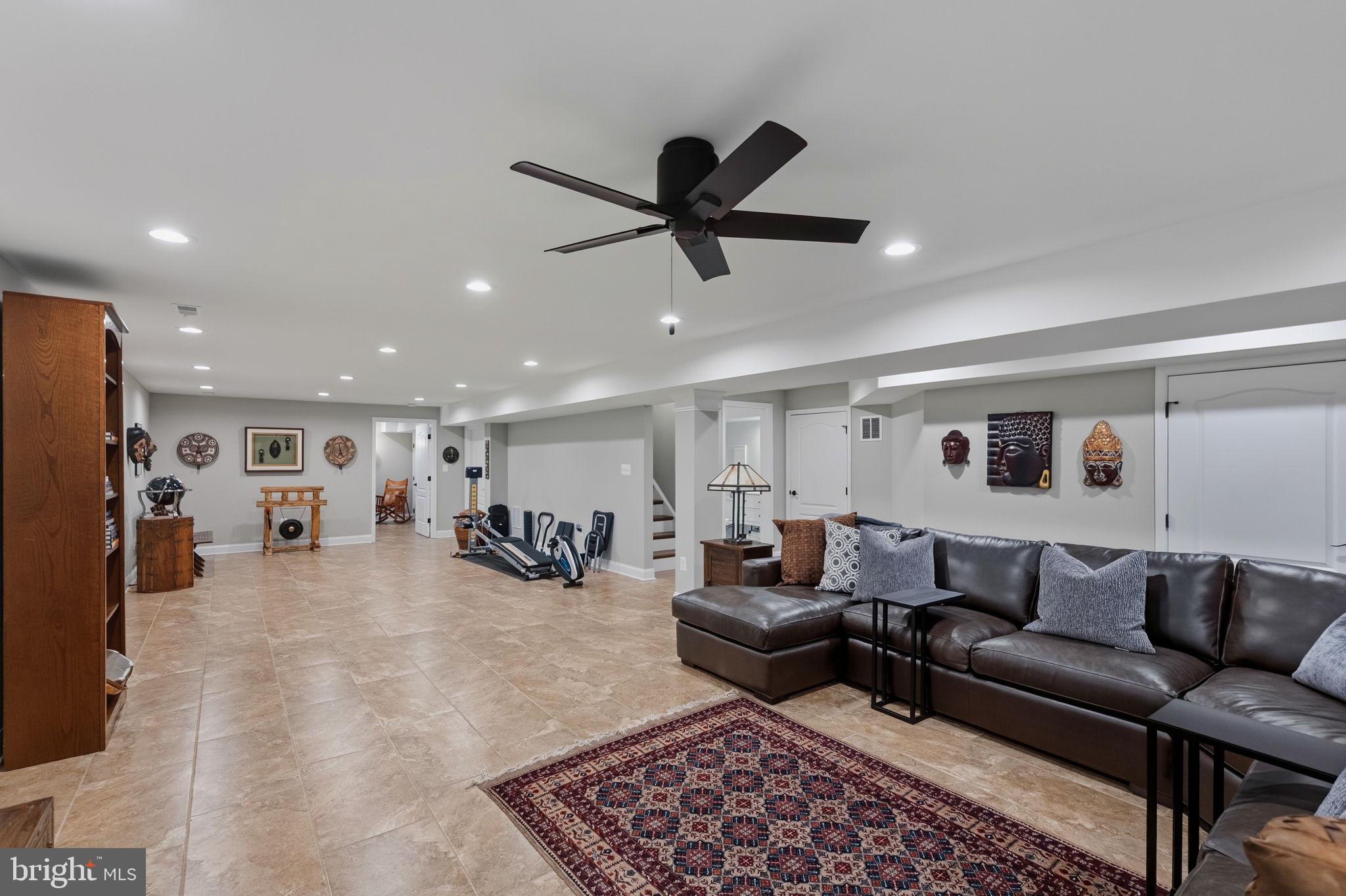 2656 Brook Valley Road Frederick, MD 21701 - Photo 70 of 89 huge family room with custom tiled floors