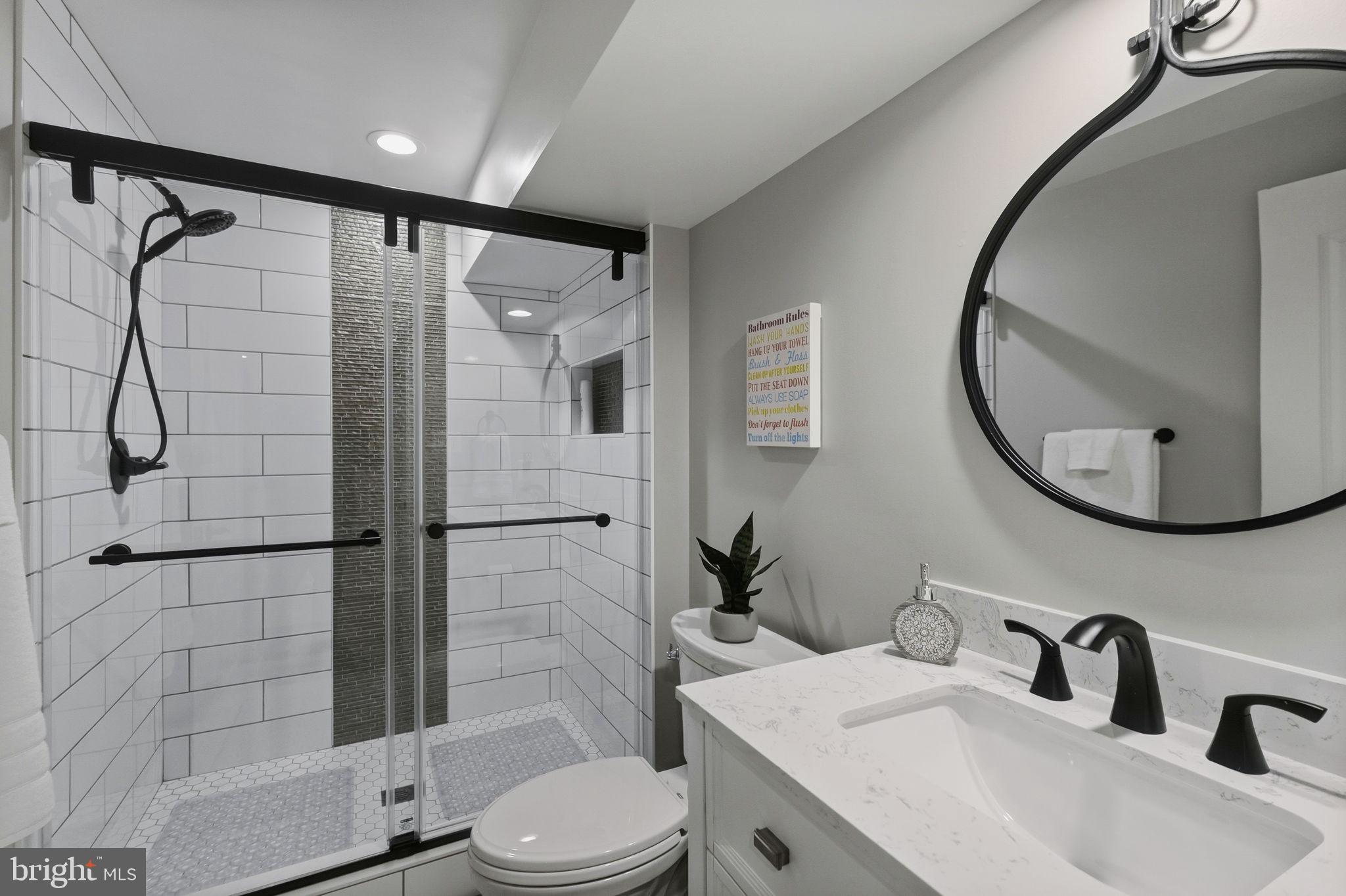 2656 Brook Valley Road Frederick, MD 21701 - Photo 76 of 89 a bathroom with a sink toilet and shower