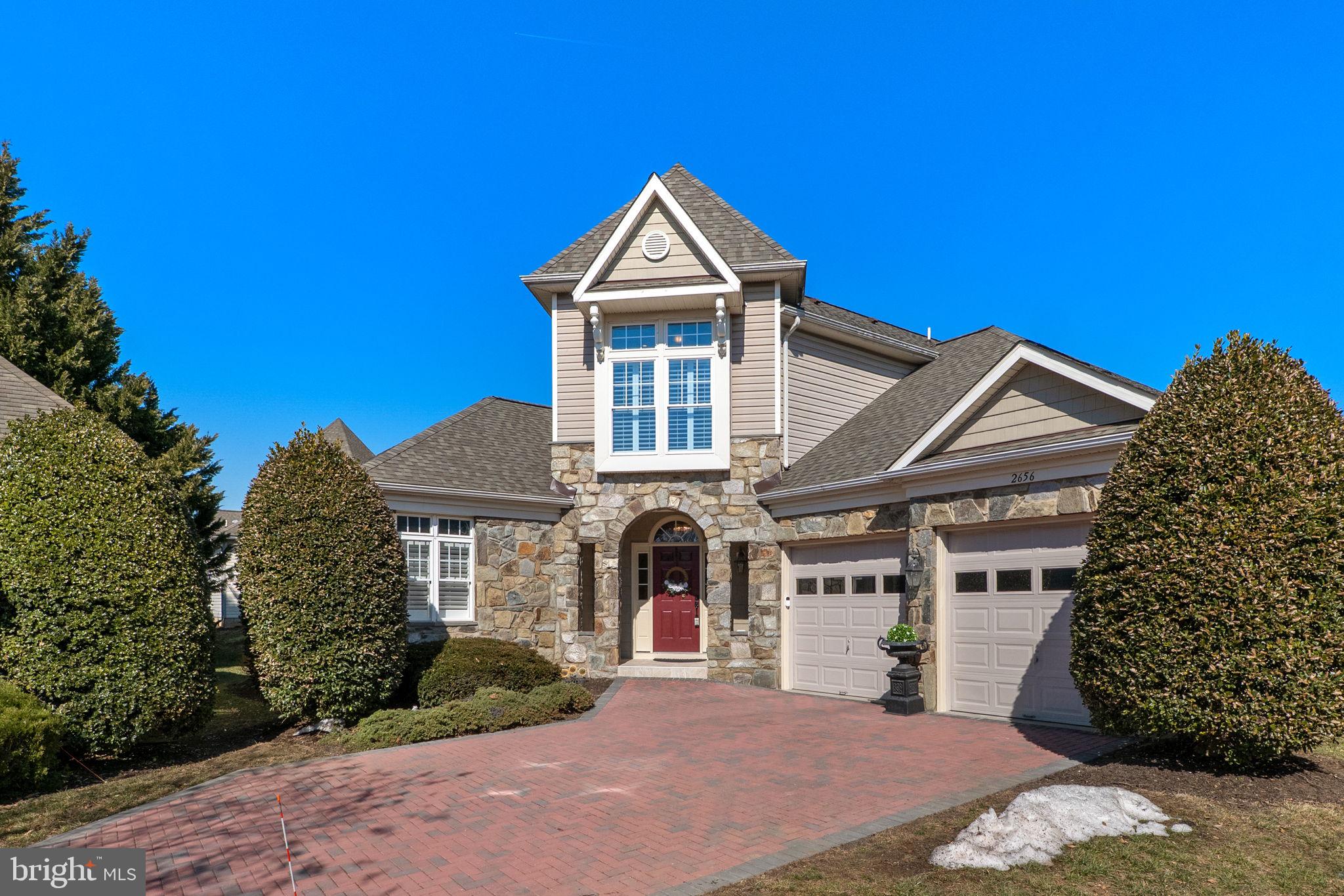 2656 Brook Valley Road Frederick, MD 21701 - Photo 82 of 89 a front view of a house with a yard and garage
